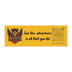 A yellow car magnet with the text 'Adventure Ted' and a QR code, featuring a cartoon bear and the slogan 'See the adventure in all that you do!'.
