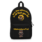 Black backpack with Adventure Ted, quote, hashtag, front pouch, and side water bottle pocket
