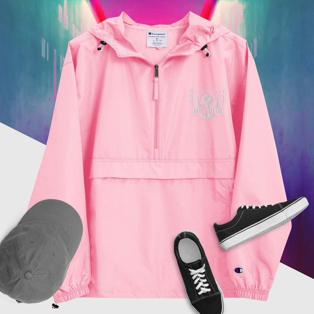 A pink candy packable jacket with embroidered 'C' logo on the left sleeve, a hood, front kangaroo pocket, and a zipped pouch pocket. It is displayed alongside a grey hat and black sneakers.