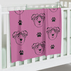 Jersey polyester blanket with paw prints and adventure ted outline. 30 inches by 40 inches (76.2cm × 101.6cm)